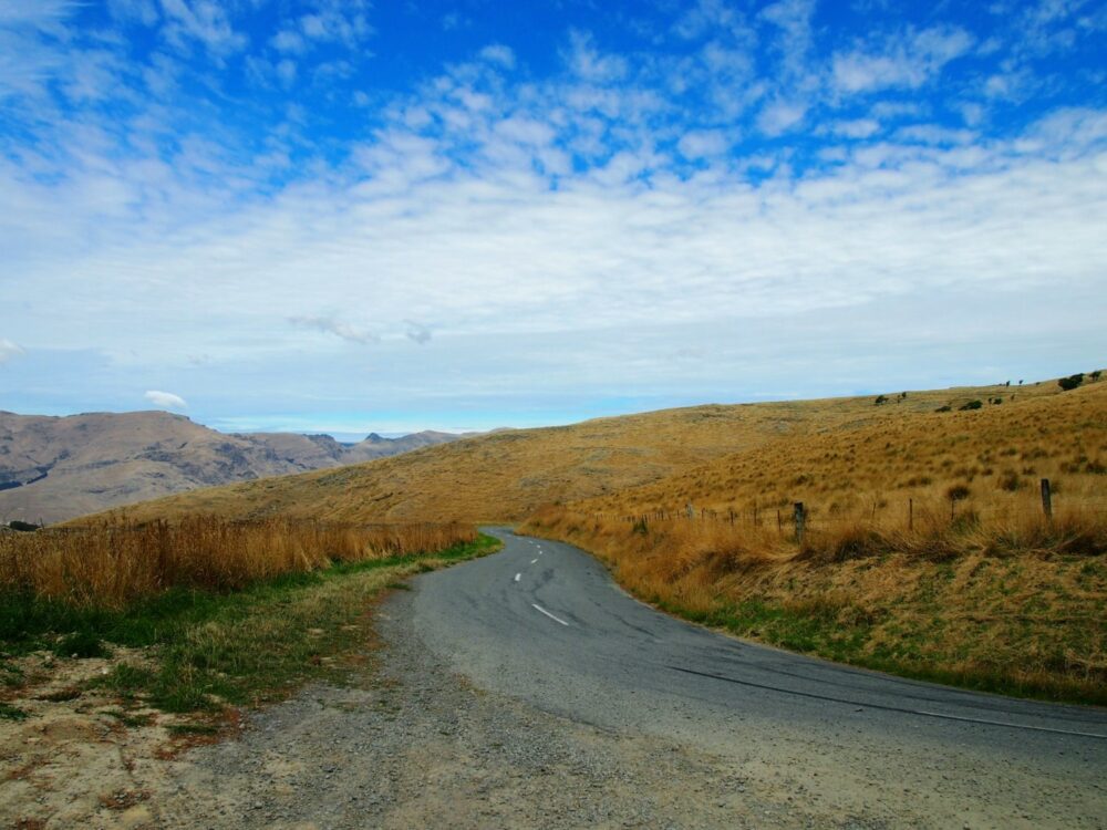 Winding narrow road on Banks Peninsula in New Zealand