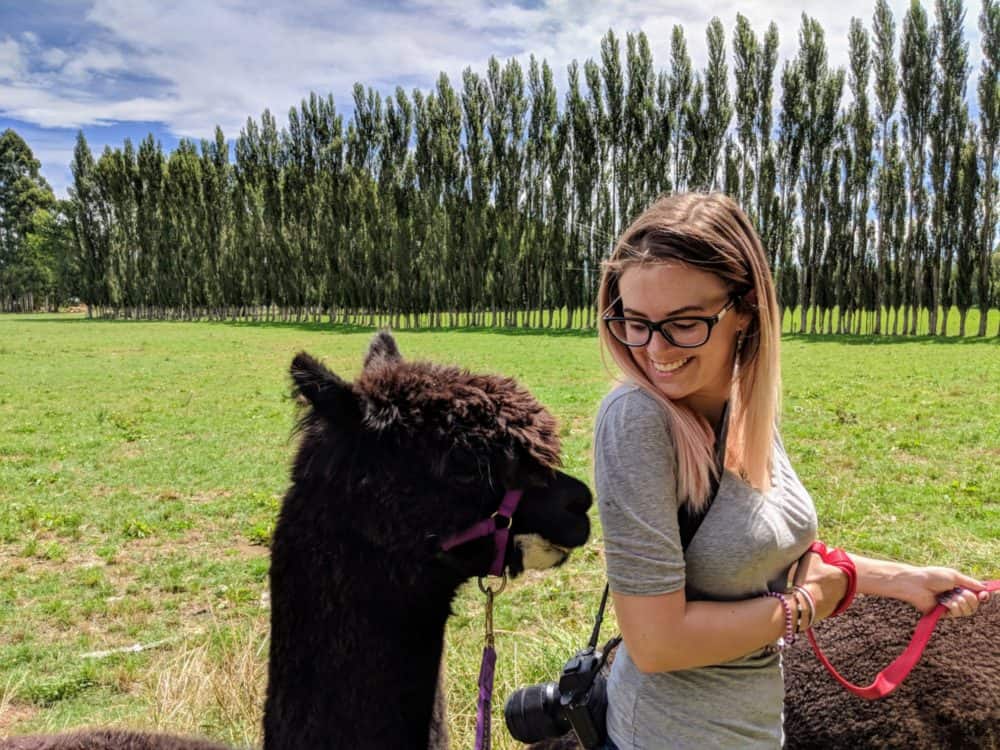 Lauren gazing lovingly at alpaca