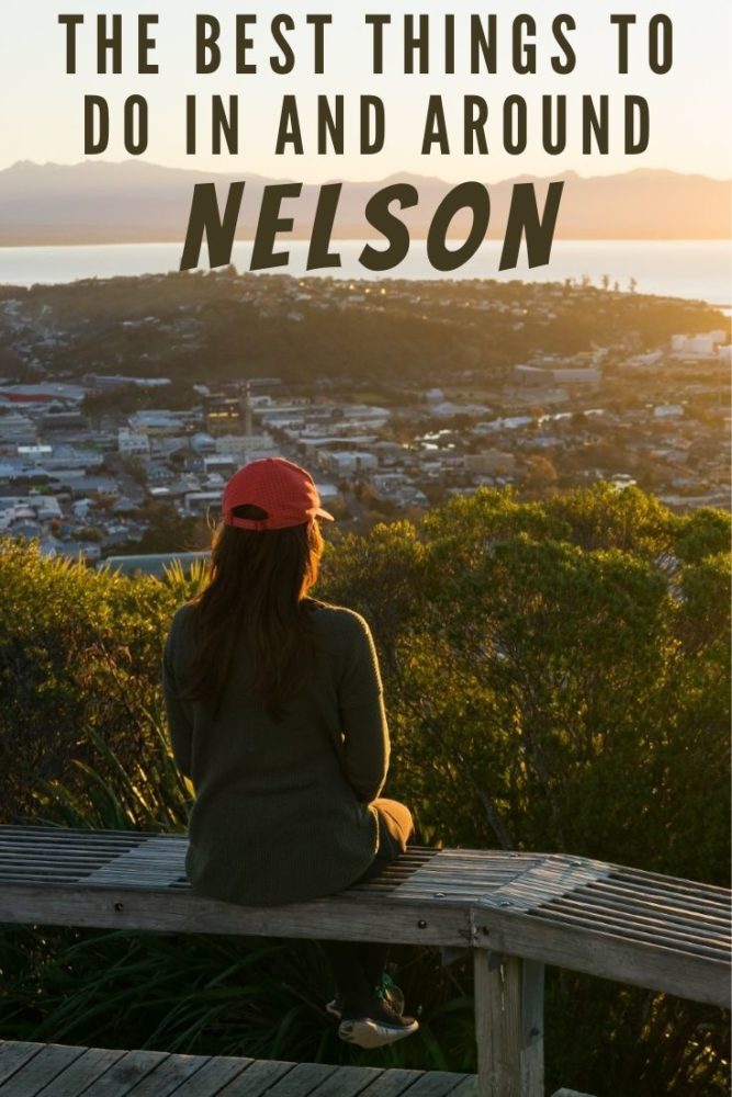 Woman sitting on a bench looking out at view over city and water, with text "The Best Things to do in and Around Nelson" at top